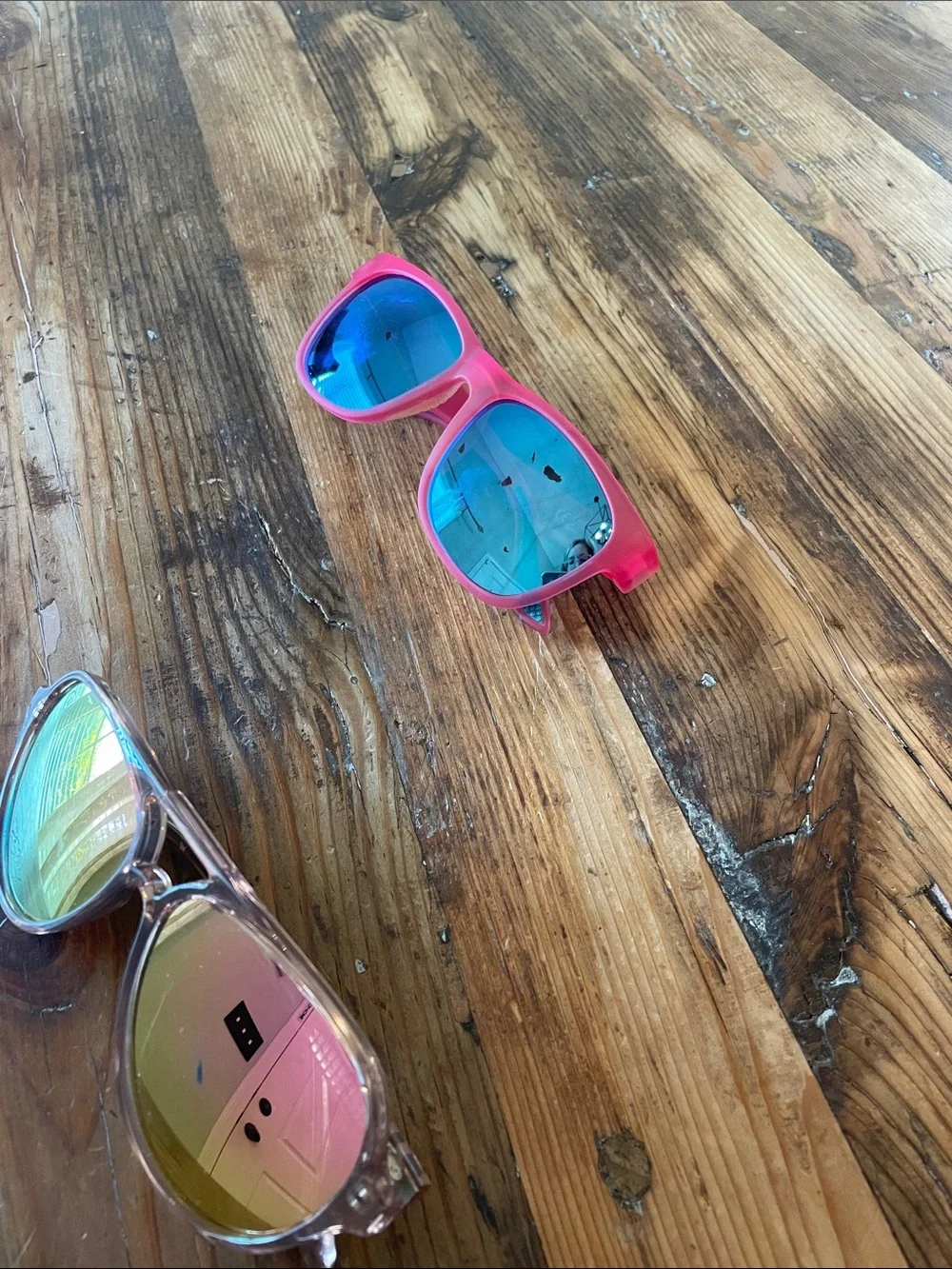 2 sunglasses Goodr and Blenders
